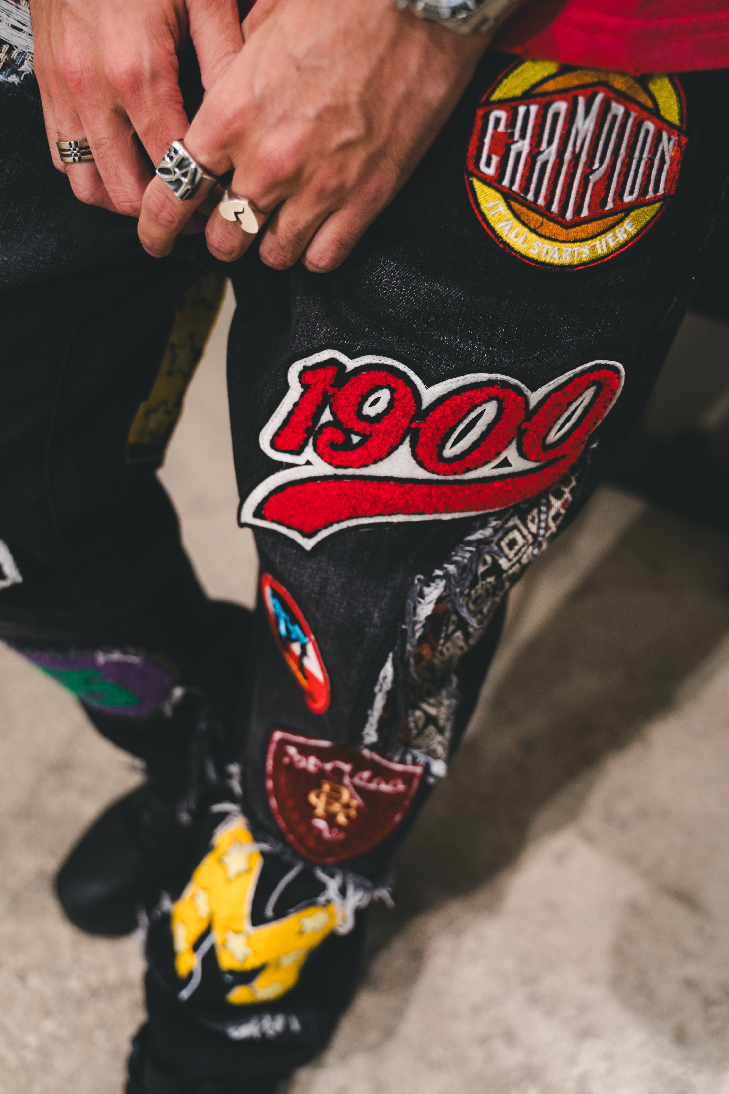 VOYAGE STUDIO VARSITY PATCHED JEANS