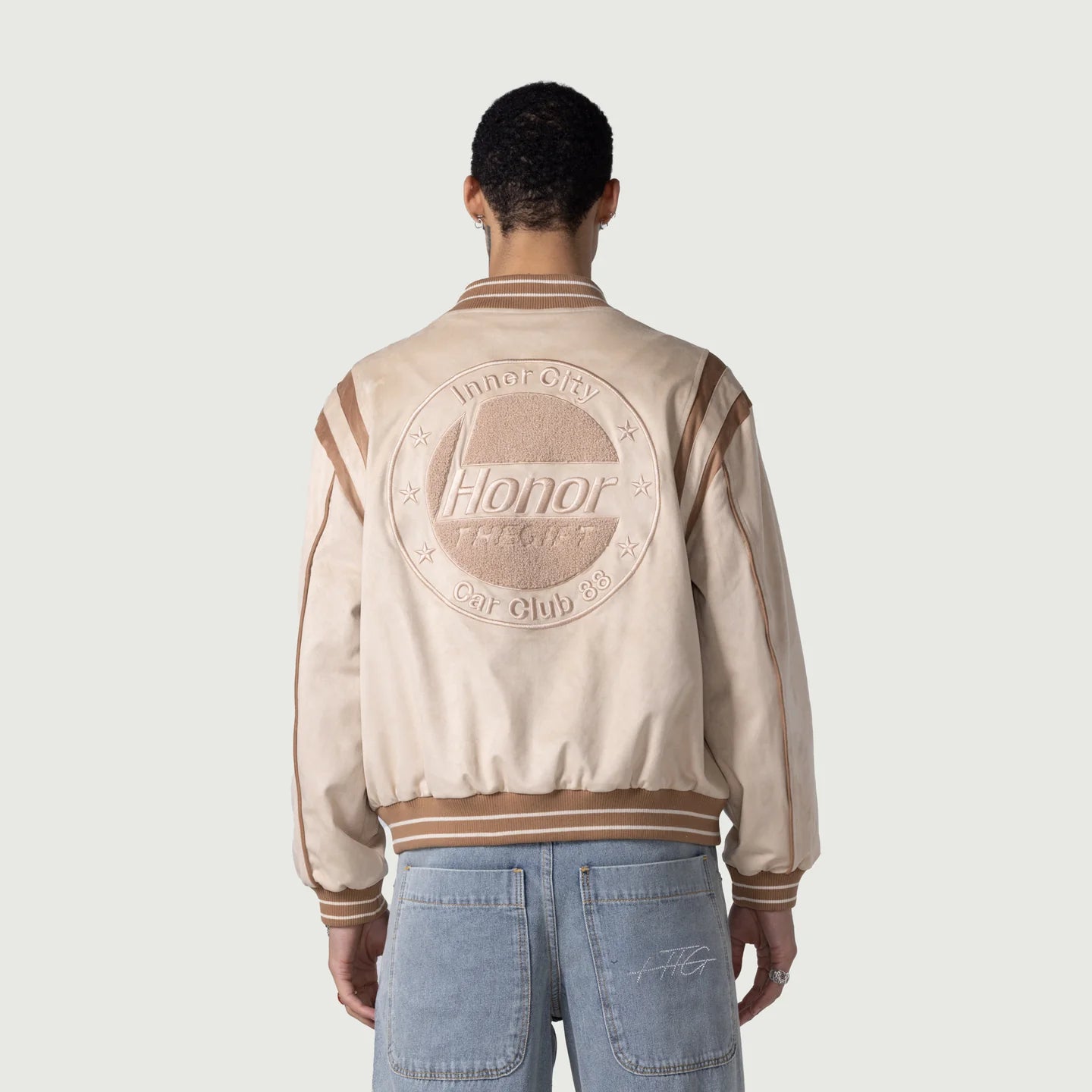 HONOR THE GIFT OIL HEAD VARSITY